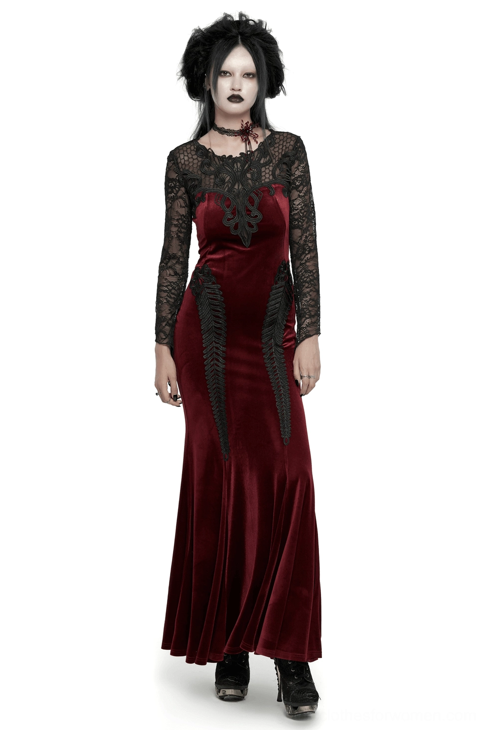 Front full-body view of burgundy velvet gothic mermaid dress with black lace sleeves and corset back on model