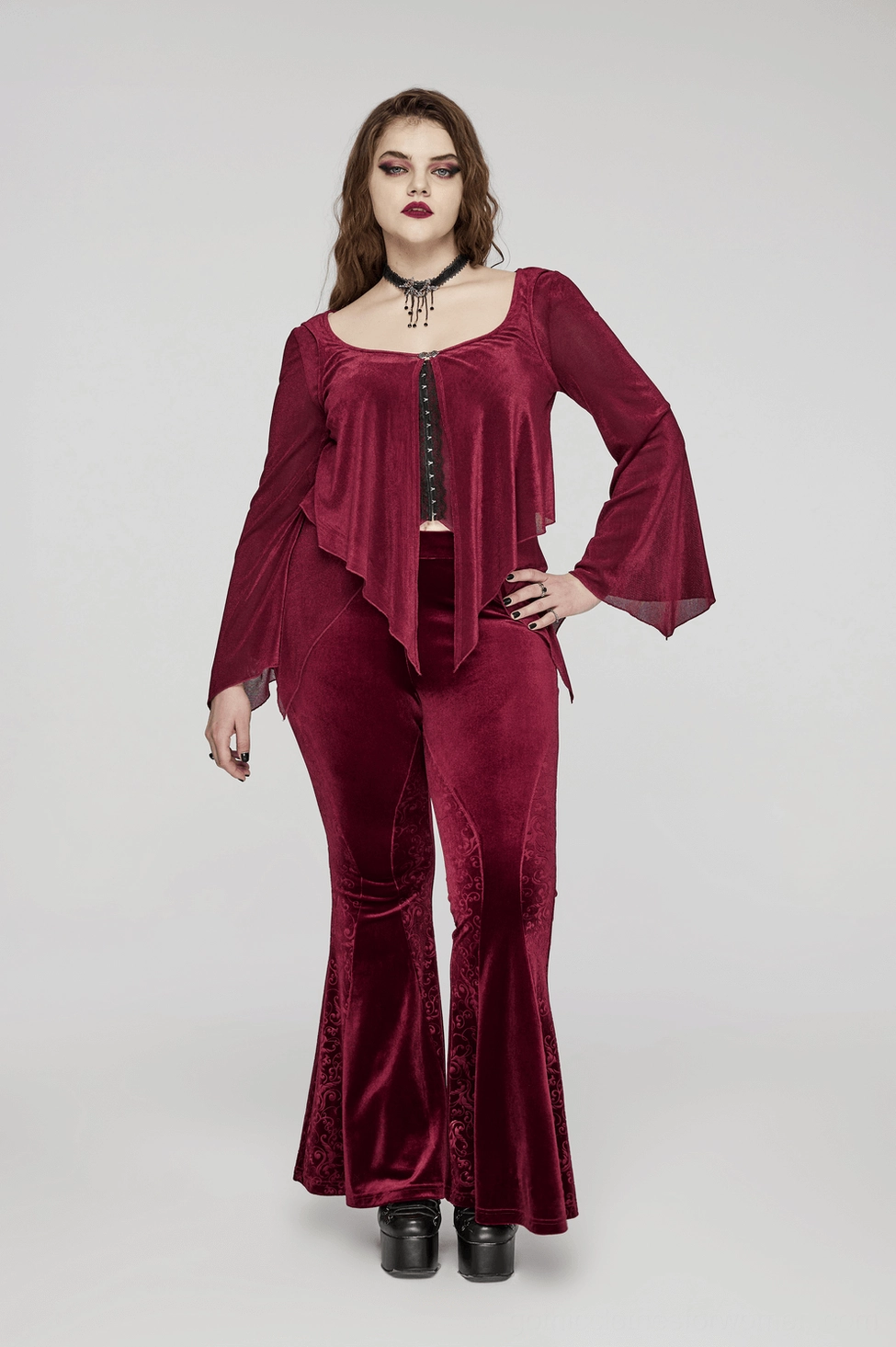 Burgundy velvet flared gothic pants worn styled look showing hourglass silhouette and luxurious drape