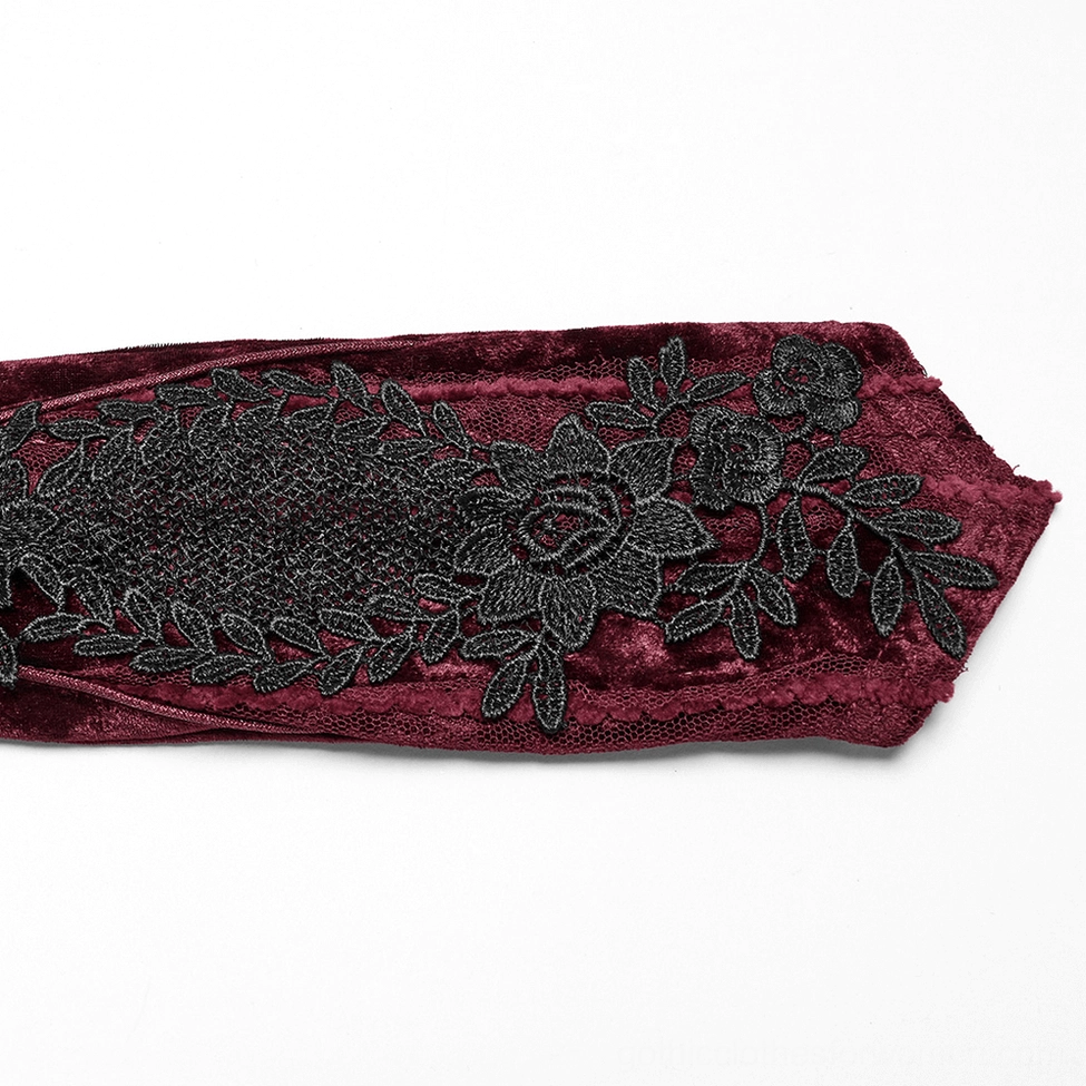 vintage-inspired 3D black floral lace embroidery on burgundy velvet opera glove forearm detail close-up