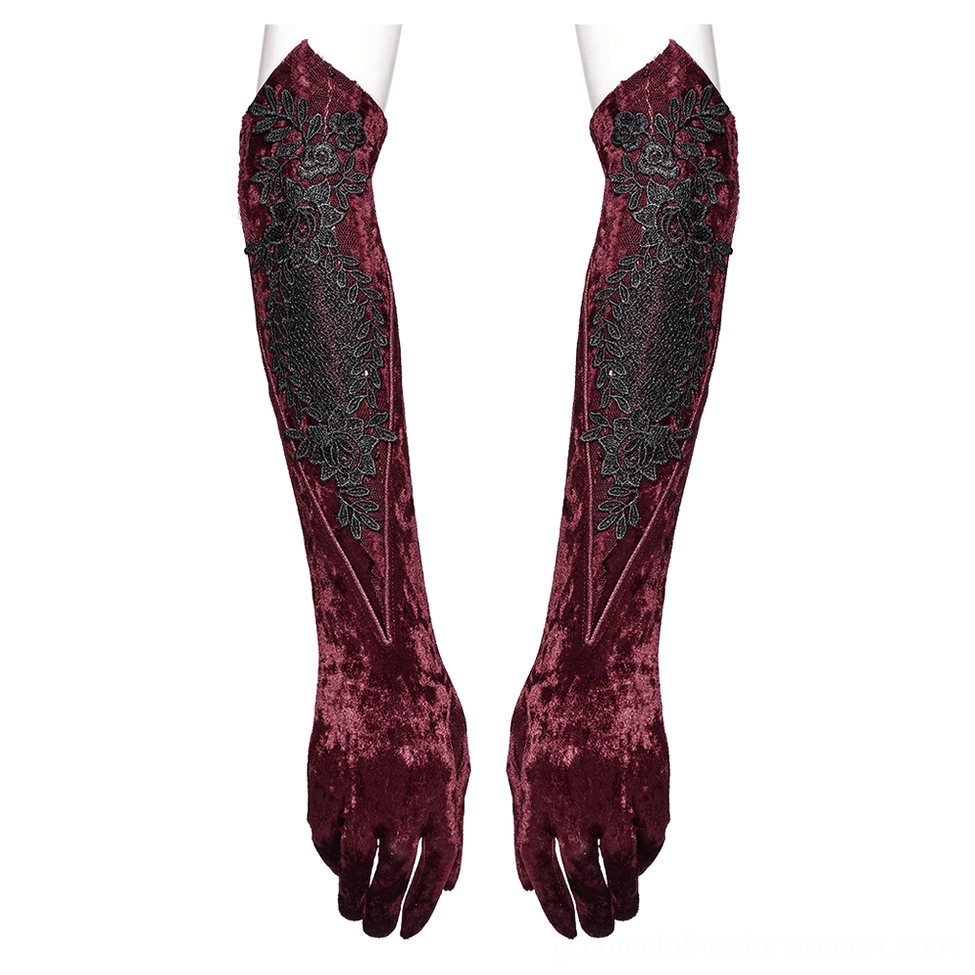 pair of burgundy velvet opera gloves with black floral lace embroidery displayed on white background