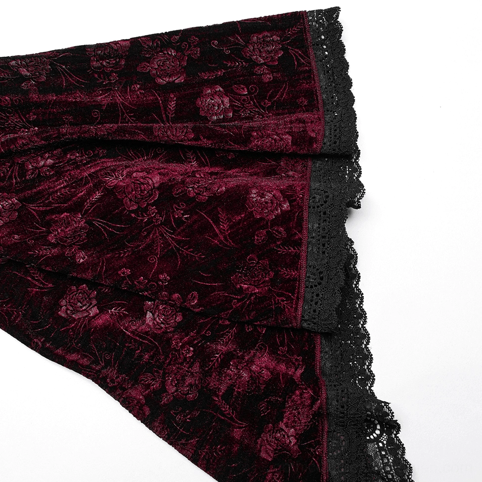 Burgundy velvet fabric swatch showing embossed rose texture and luxurious pile detail