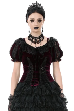 Burgundy Victorian bolero shrug with black lace and rose appliqué worn by goth model in front full-body shot