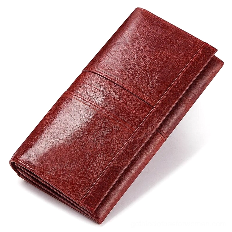 Burgundy red long wallet clutch featuring cracked glossy genuine leather texture with horizontal stripe details - close-up studio view