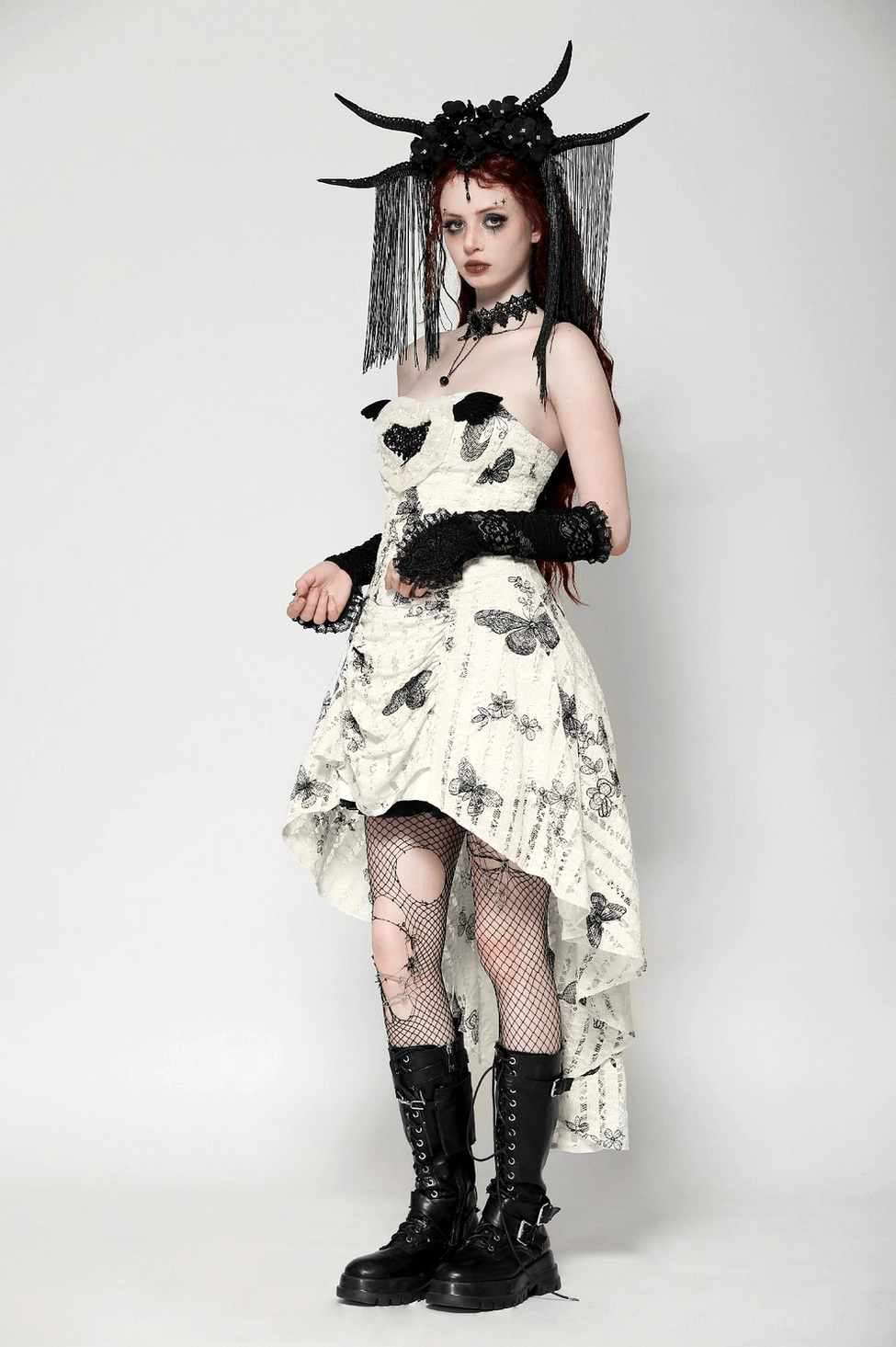 Three-quarter view of black butterfly off-shoulder gothic dress showing overall fit, lace-up back placement, and dress proportions