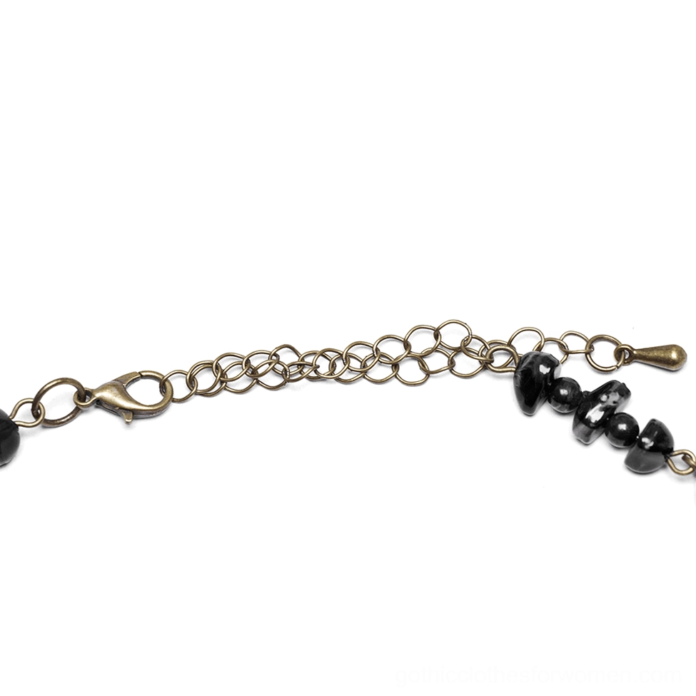 Extended view of gothic necklace showing adjustable chain extension with bronze lobster clasp mechanism