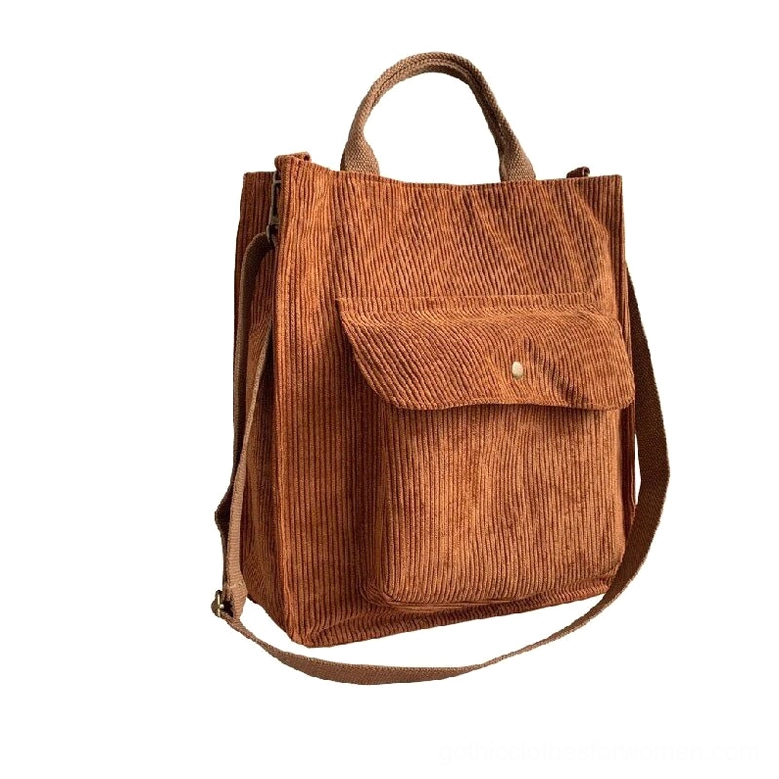 Camel brown corduroy gothic tote bag with dual carrying handles and snap pocket, front flat display with rich earthy gothic tones