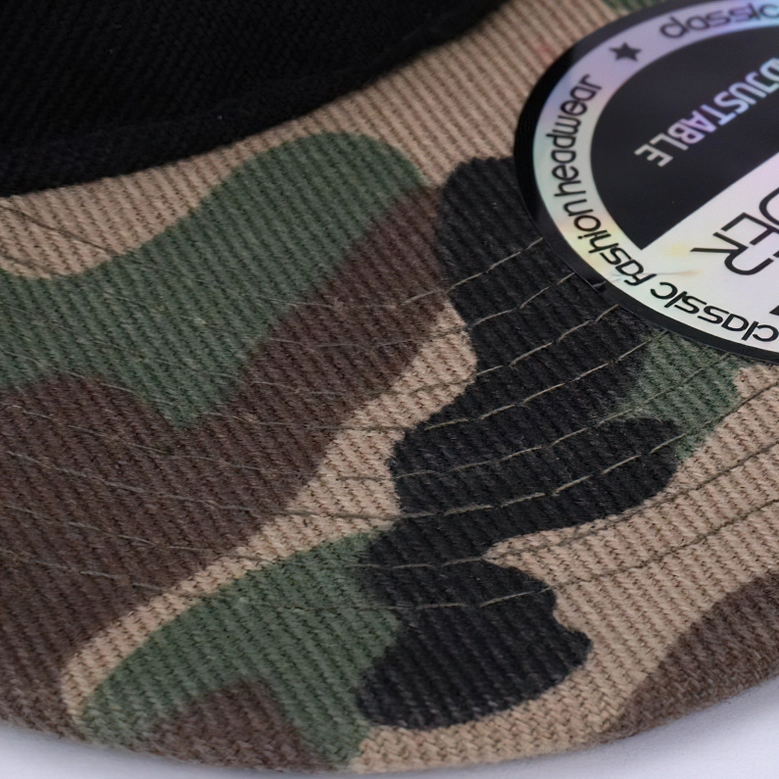 Military camo snapback visor detail showing fabric texture and pattern clarity