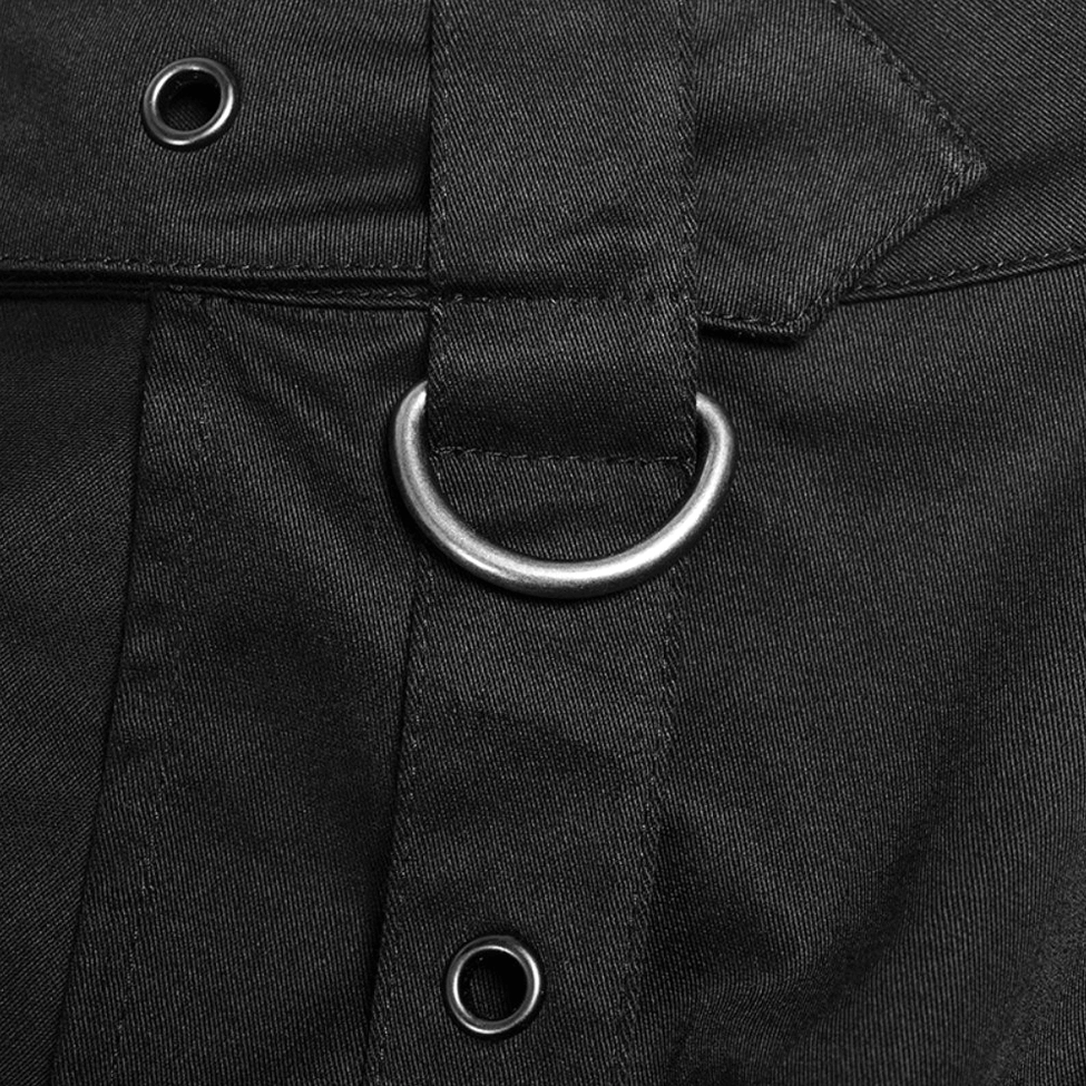 Detailed closeup of black cargo skirt hardware including metal D-ring snap fasteners and precise stitching on woven fabric