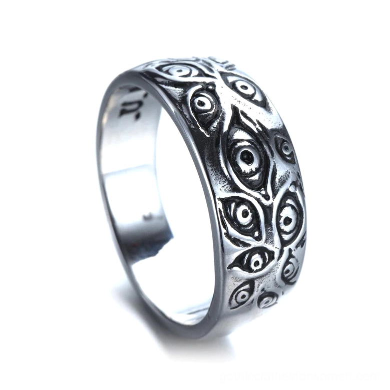Silver gothic carved eyes punk ring multiple angles showcase intricate eye carvings on band surface with inner letter stamps and polished finish