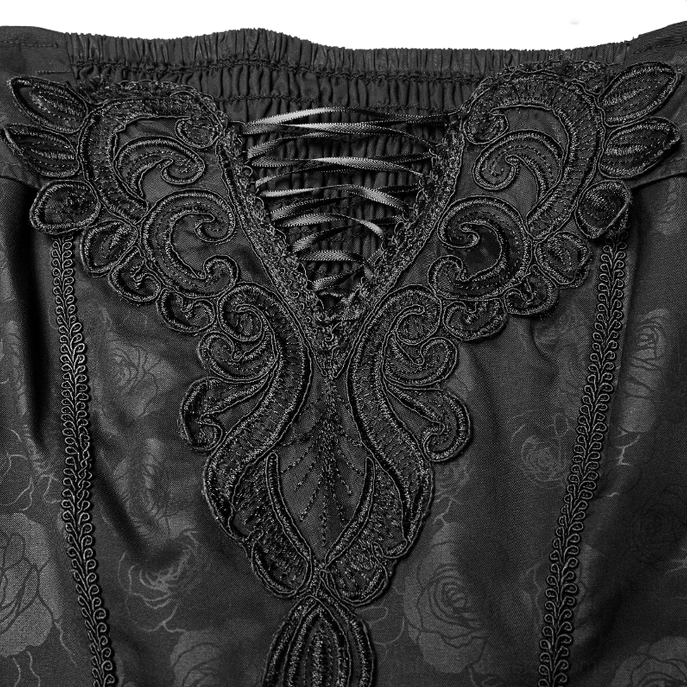 Celestia gothic dress bodice detail showcasing scroll embroidery trim, ribbon lace-up system, and rose-printed fabric base