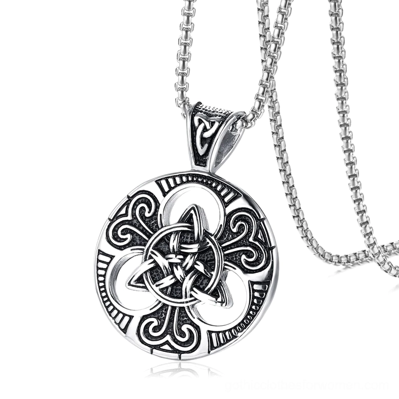 Antique silver Celtic knot pendant with stainless steel chain displayed, side profile showing ornate engraved circular design and gothic aesthetic