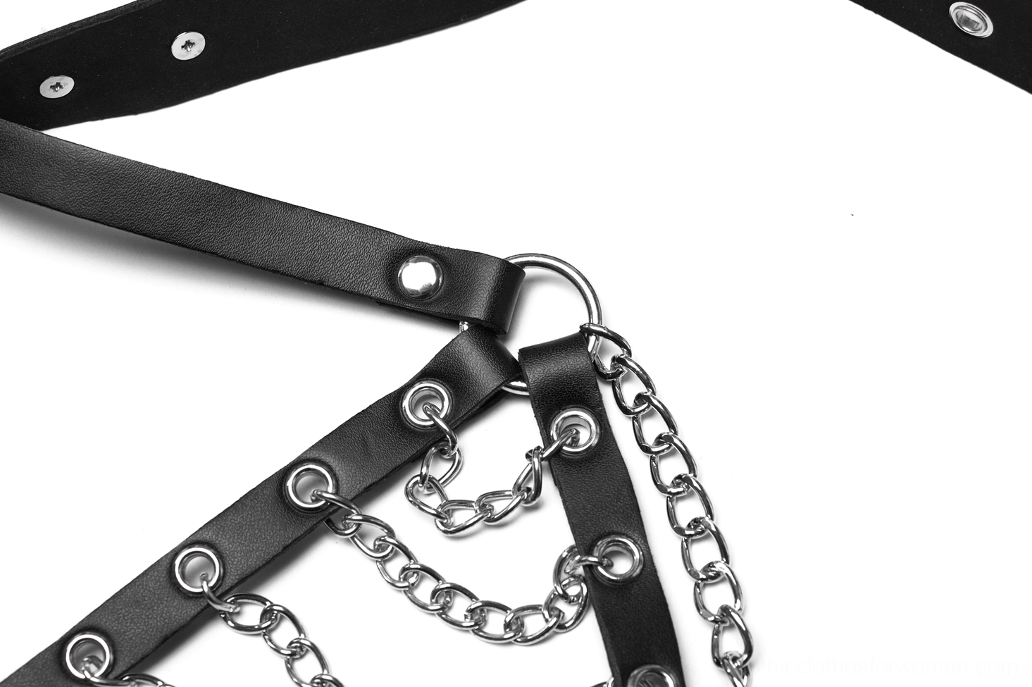 Silver chain shoulder harness detail showcasing layered metallic construction and attachment points