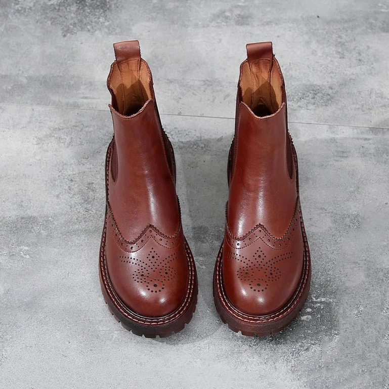 Complete ankle boot construction showing elastic gore and chunky platform detail engineering