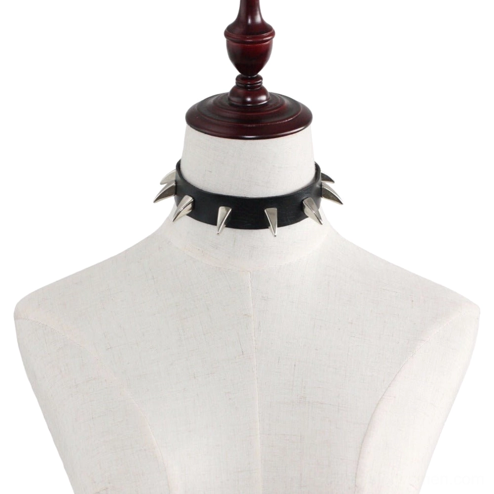 Spiked leather gothic choker necklace closeup of metal spike studs and adjustable fastening system