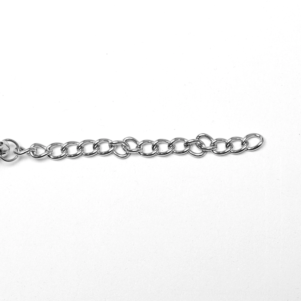 Extender chain for gothic choker necklace, polished silver-toned metal with lobster claw clasp, flat lay view