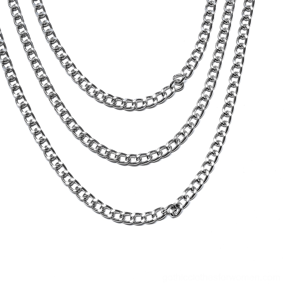Multi-tiered polished silver curb chains isolated view, showing three-layer chain suspension system