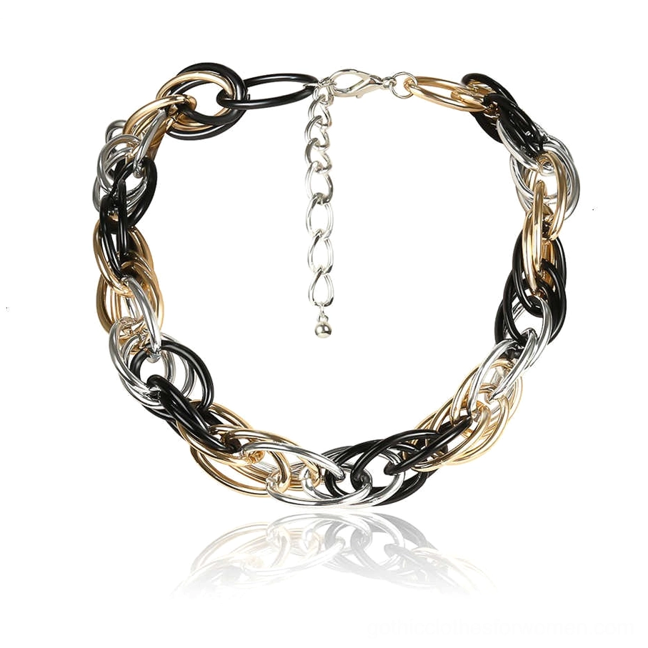 Tri-tone twisted curb chain necklace flat lay with adjustable extender, showing chunky mixed black gold and silver links