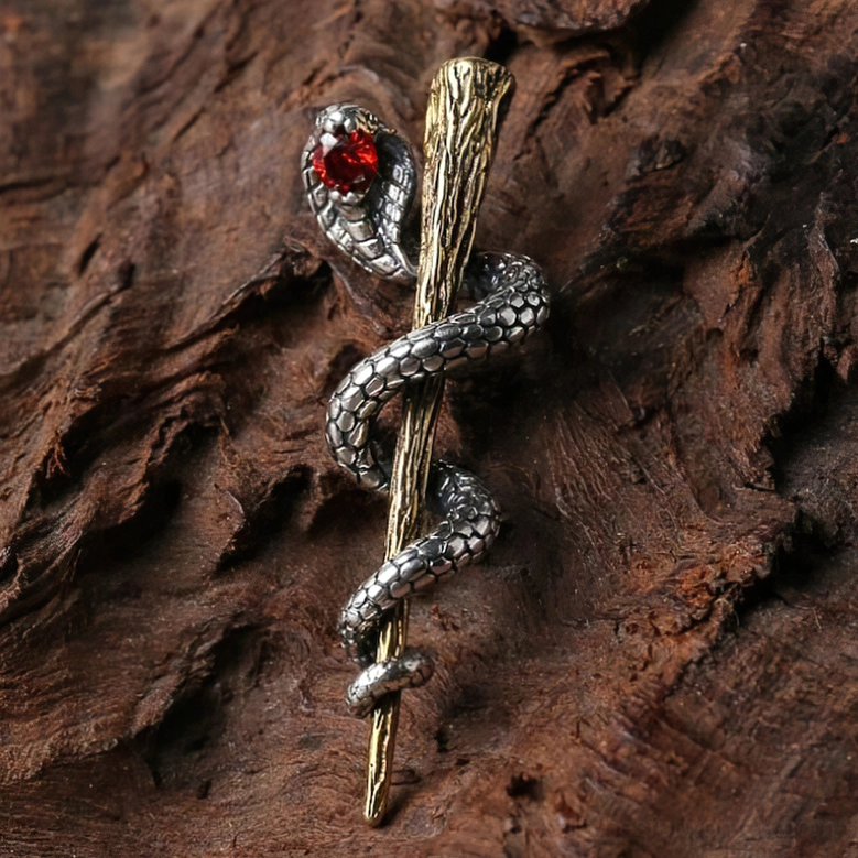 Antiqued sterling silver cobra pendant showcasing intricate scaled texture detail