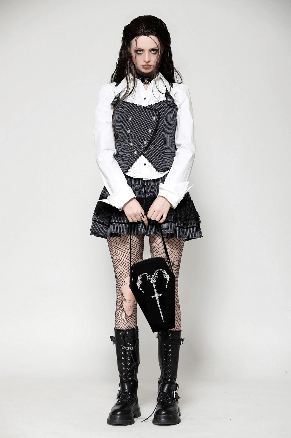 Black coffin shoulder bag detailed view of embroidered sword and ornamental filigree heart pattern
