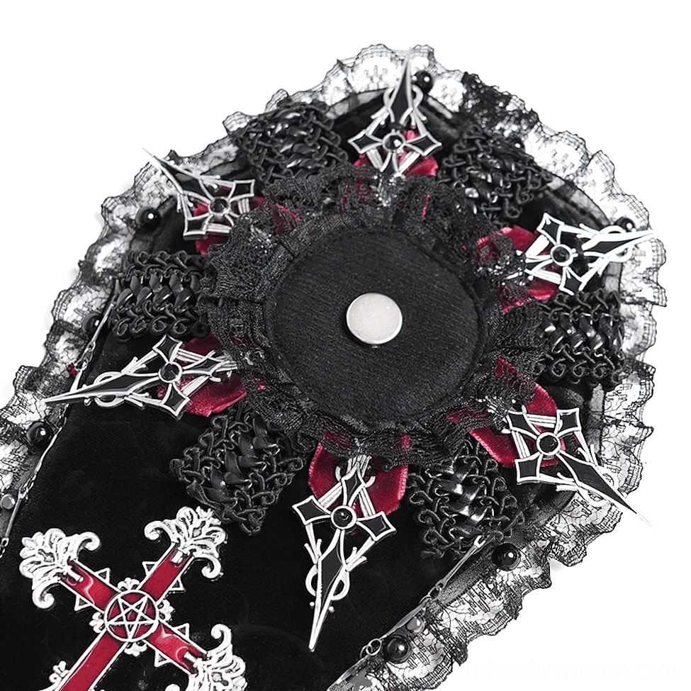 Top-down close-up of coffin brooch featuring embossed velvet base, metal pentagram cross, and ruffled lace border with beaded accents