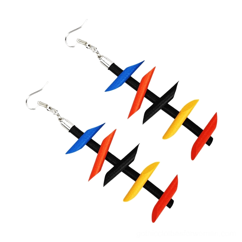 Color block twisted spike rubber dangle earrings two pairs black red yellow blue gothic jewelry flat lay
