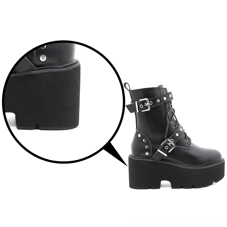 Close-up detail of black combat boots thick rubber platform heel and block heel construction