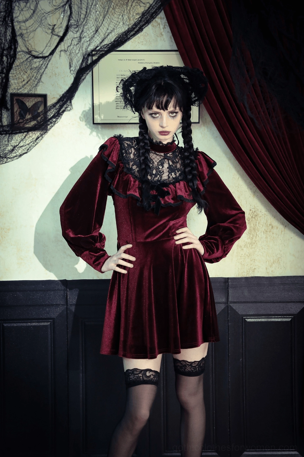 Complete view of burgundy velvet gothic mini dress with all design elements visible