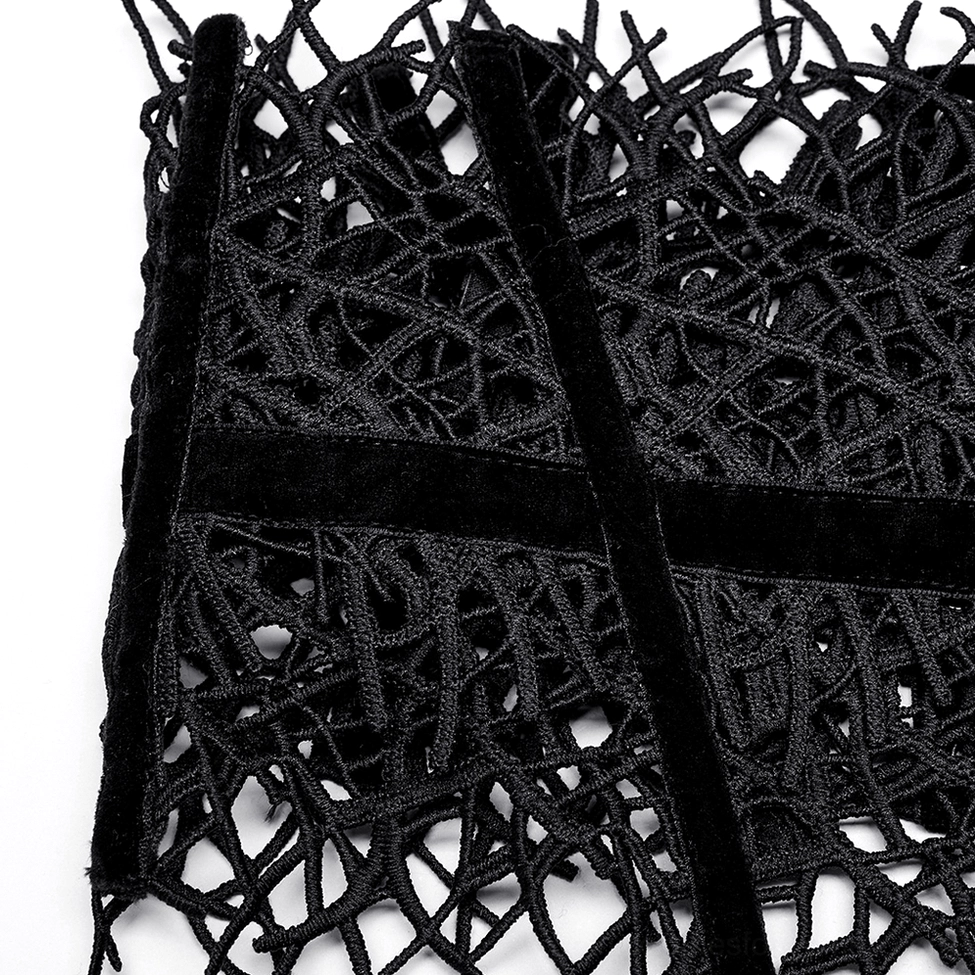 Macro close-up of hollow branch lace texture showing intricate hollow vine pattern and velvet strap details