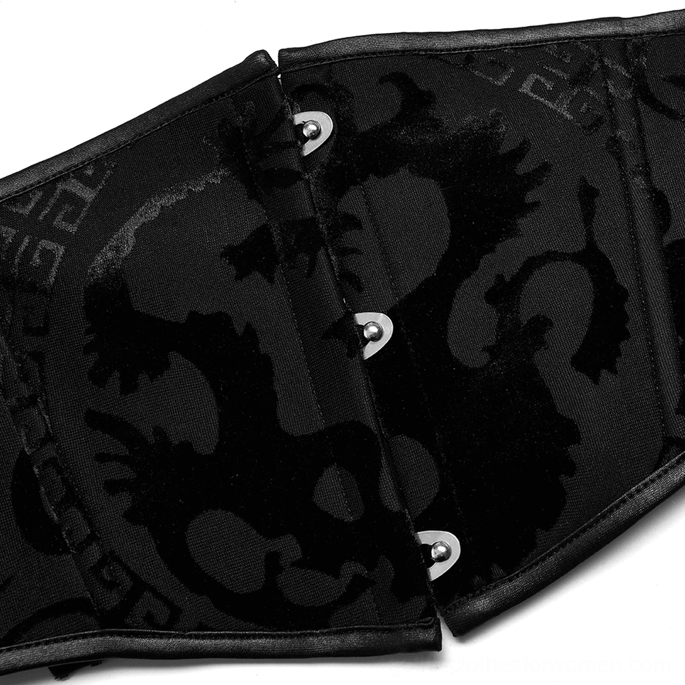 Close-up front view of metal snap button closure on dragon corset belt with raised velvet print detail