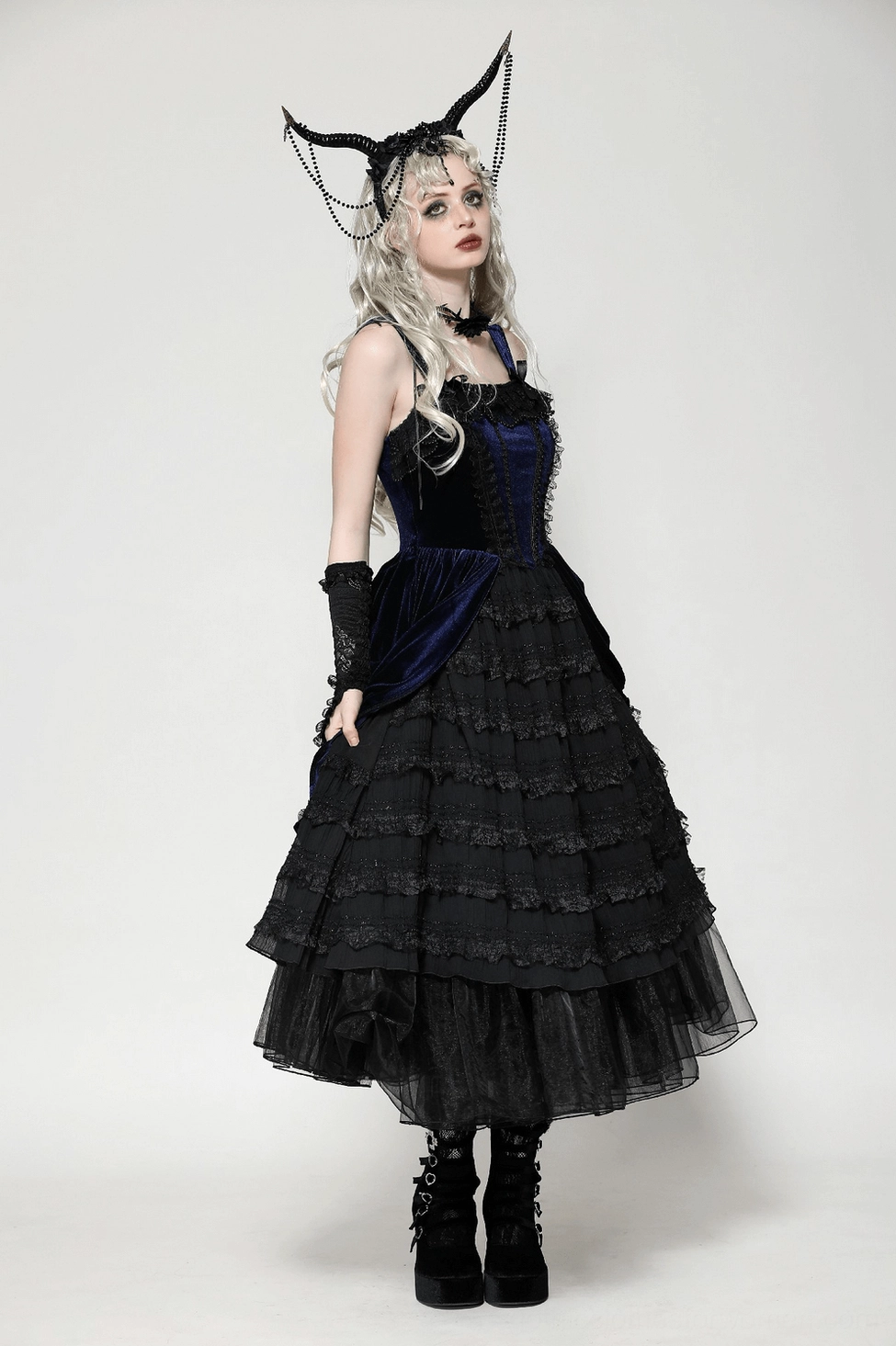 Product detail shot of Gothic Lolita dress highlighting corset bodice construction and lace appliqué work