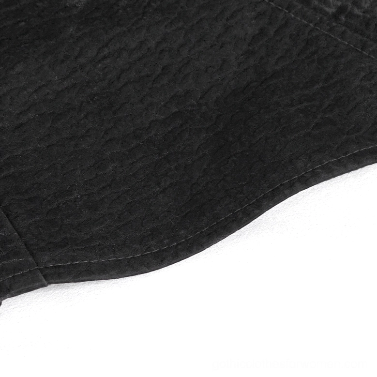 Close-up texture shot of matte black wrinkled fabric of gothic corset