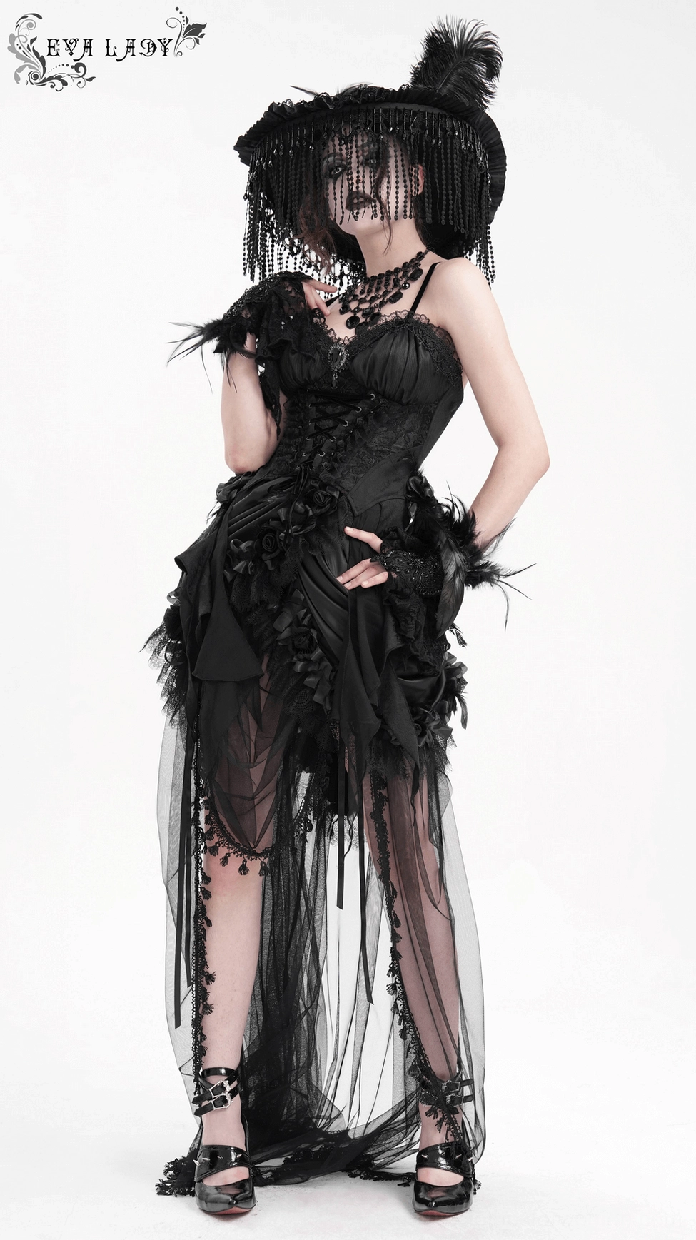 Front detail of black corset with embroidered rose accents and velvet lace-up construction