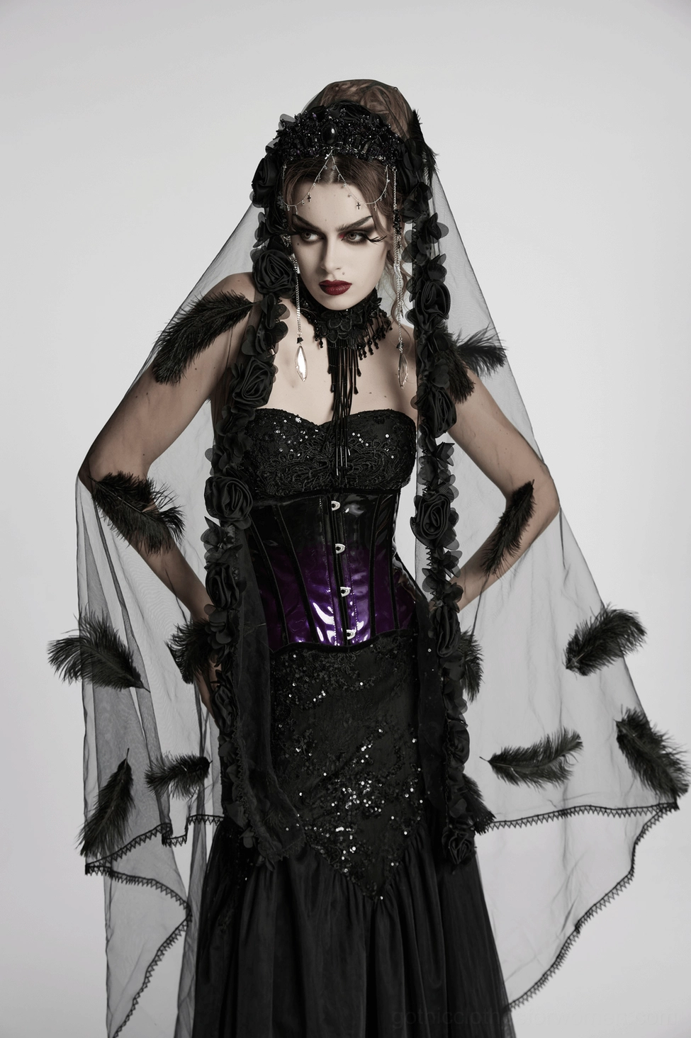 Close-up fashion detail of underbust corset front metal hook closures on glossy gradient patent leather surface