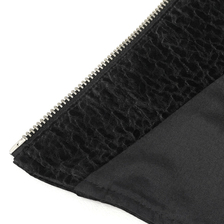 Close-up detail of silver metal front zipper and black corset fabric with inner lining visible