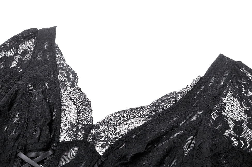 Close-up detail of layered lace V-neckline on gothic corset top showing intricate delicate lace texture