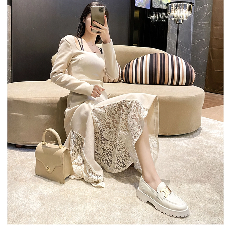 Cream white gothic platform loafers worn by female model in elegant dress, mirror selfie composition in modern home interior, demonstrating how loafers bridge casual and refined aesthetics