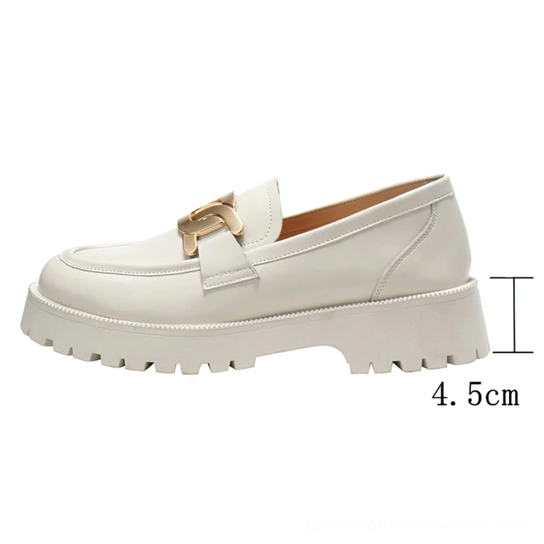 Cream white gothic slip-on loafers with chunky white rubber platform sole and gold chain ornament, side profile emphasizing elevated heel design and smooth leather finish