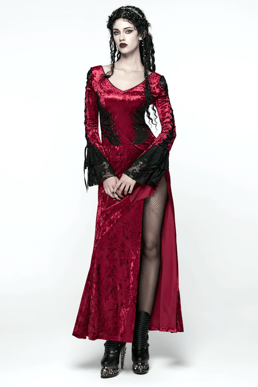 Full-length back view of crimson velvet gothic formal dress displaying lace-up corset, theatrical fishtail design, and floor-length hem