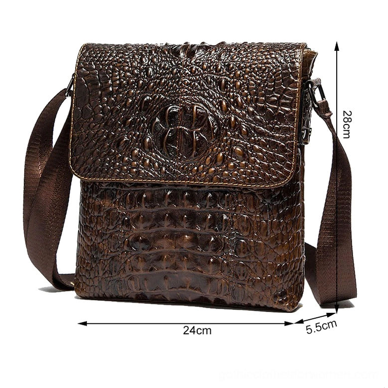 Gothic leather bag dimensions 28cm x 24cm x 5.5cm with size scale markers in studio