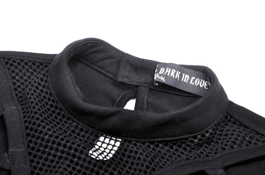 Close-up detail of black gothic crop top neckline showing mesh fabric and brand tag