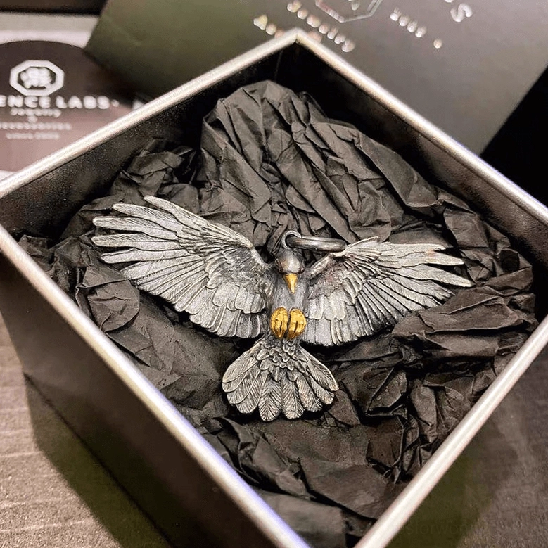 Silver crow gothic necklace pendant in luxury gift box with dark crumpled paper lining, perfect for gifting