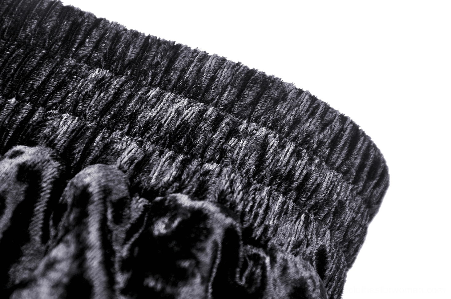 Close-up of crushed velvet texture and hand-stitched ruching on gothic skirt fabric