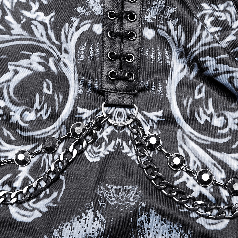 Close-up of cyberpunk gothic dress removable metal chain with O-ring hardware and ornate sci-fi print pattern