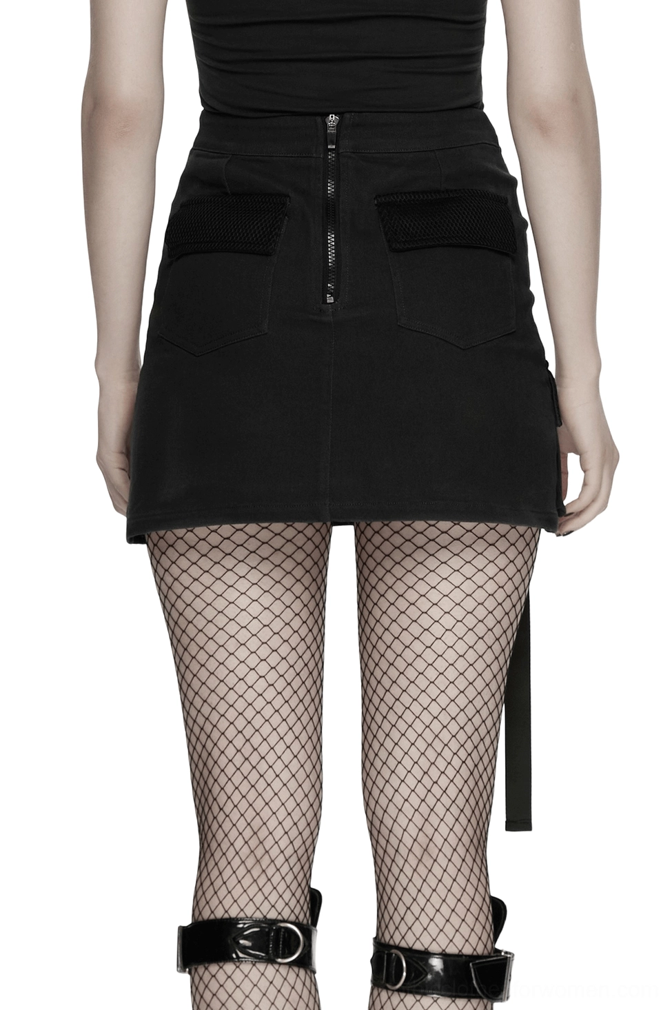 High-waisted black cyberpunk mini skirt with back zipper closure and dual front flap pockets worn with fishnet stockings, full rear view