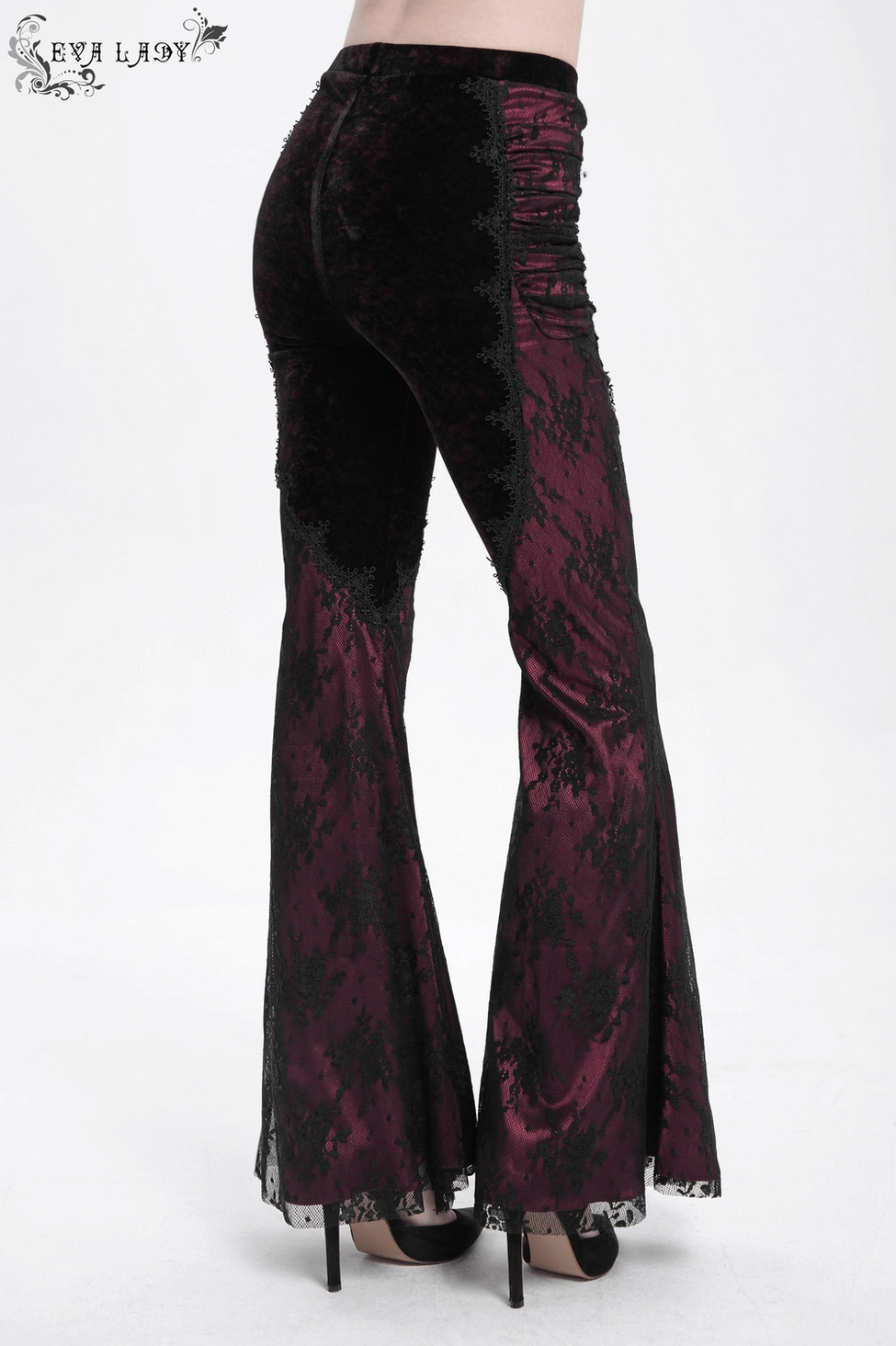 Dark academia gothic trousers in black velvet with burgundy lace leg panels and high-waisted architectural construction