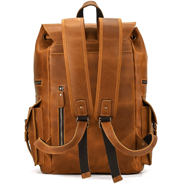 Dark brown gothic leather backpack detail shot exterior pocket construction