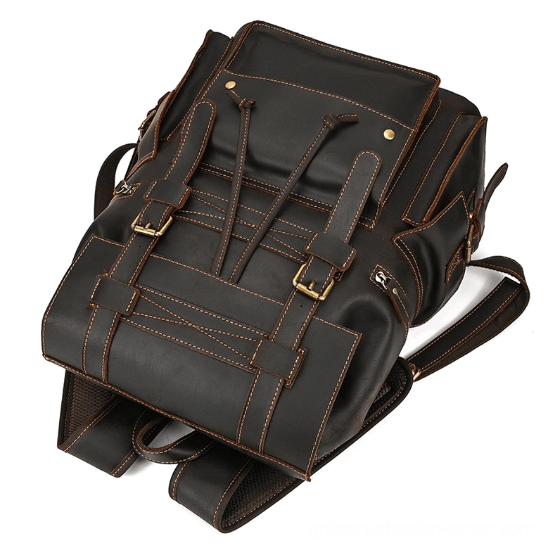 Dark brown gothic leather laptop backpack three-quarter profile view