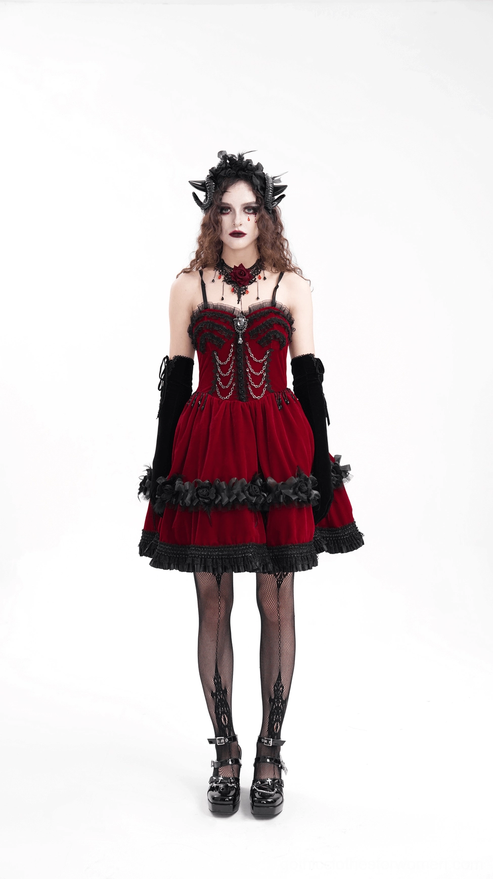 Dark fashion spiral horn headpiece with black ribbon fastening and floral gothic accents, front showcase