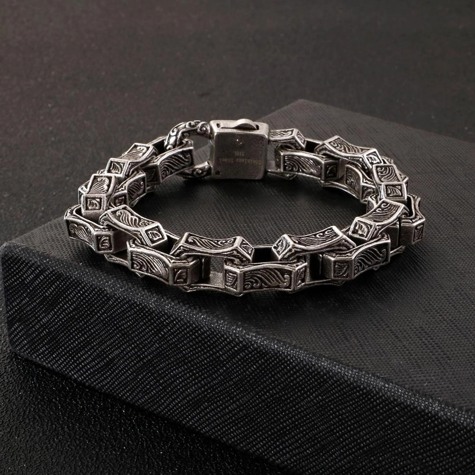 Dark gothic engraved square link stainless steel cuff bracelet main product view studio photography