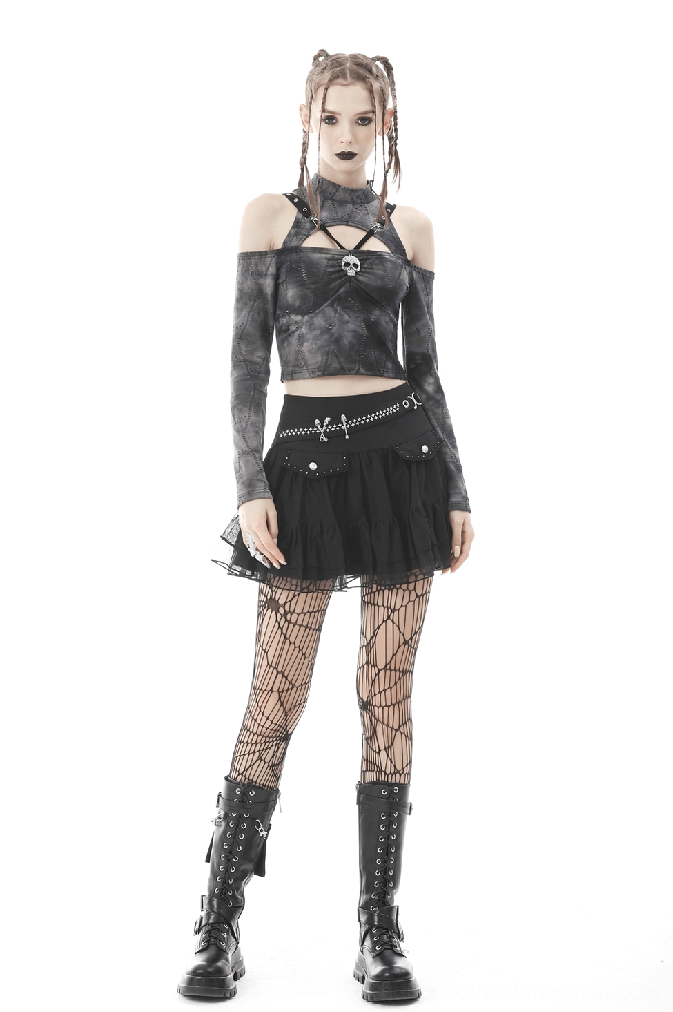 Dark gothic mini skirt featuring star studs, mesh overlay, and authentic metal hardware details